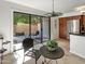 Kitchen area with sliding door leading to a private patio at 4950 N Miller Rd # 130, Scottsdale, AZ 85251