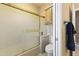 Bathroom includes a glass shower door and built in cabinet at 5345 E Mclellan Rd # 89, Mesa, AZ 85205