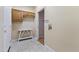 Mud room featuring ample storage and light coming in from the exterior doors at 5345 E Mclellan Rd # 89, Mesa, AZ 85205