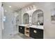 Stylish bathroom with floating vanity, dual sinks, and glass shower enclosure at 545 W Windsor Ave, Phoenix, AZ 85003