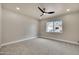 Bright bedroom with a ceiling fan and window letting in natural light at 545 W Windsor Ave, Phoenix, AZ 85003
