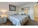 Cozy bedroom with mirrored closet doors and comfortable bedding at 633 S 77Th St, Mesa, AZ 85208