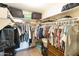 Walk-in closet with ample shelving and hanging space at 633 S 77Th St, Mesa, AZ 85208