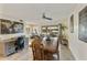 Bright dining area with wood table, chairs, and view of backyard at 633 S 77Th St, Mesa, AZ 85208