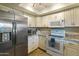 Well-equipped kitchen with stainless steel appliances and granite countertops at 633 S 77Th St, Mesa, AZ 85208