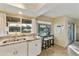 Updated kitchen with granite counters, stainless steel appliances, and backyard view at 633 S 77Th St, Mesa, AZ 85208
