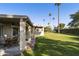 Covered patio with seating area and brick flooring at 633 S 77Th St, Mesa, AZ 85208