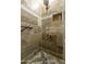 Tiled shower with modern fixtures and built-in shelf at 633 S 77Th St, Mesa, AZ 85208