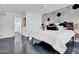 Main bedroom with a wooden headboard and geometric wall at 6502 N Central Ave # B104, Phoenix, AZ 85012