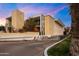 The Olympus building with palm trees and a driveway at 6502 N Central Ave # B104, Phoenix, AZ 85012