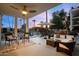Covered patio with seating and ceiling fan at 6502 N Central Ave # B104, Phoenix, AZ 85012