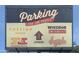 The parking sign promotes Postino winecafe, Windsor Churn, Federal Pizza and Joyride Taco House at 6502 N Central Ave # B104, Phoenix, AZ 85012