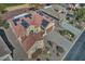 Aerial view of a home with solar panels and desert landscaping at 6548 W Saratoga Way, Florence, AZ 85132