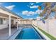 Inviting backyard with a refreshing blue pool and covered patio at 6632 E Latham St, Scottsdale, AZ 85257