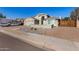 A well-maintained home with desert landscaping, RV parking, and a gated driveway at 7810 W Beryl Ave, Peoria, AZ 85345