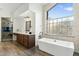 Spa-like bathroom with soaking tub and walk-in shower at 10102 E Saddle Horn Trl, Scottsdale, AZ 85255