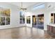 Bright dining area with sliding doors leading to the backyard and pool at 10102 E Saddle Horn Trl, Scottsdale, AZ 85255