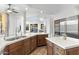 Spacious kitchen with island, stainless steel appliances, and hardwood floors at 10102 E Saddle Horn Trl, Scottsdale, AZ 85255