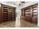 Built-in bookcases and hardwood floors at 10102 E Saddle Horn Trl, Scottsdale, AZ 85255