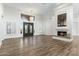 Spacious living room with fireplace and hardwood floors at 10102 E Saddle Horn Trl, Scottsdale, AZ 85255