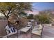 Outdoor patio with firepit and comfortable seating at 10102 E Saddle Horn Trl, Scottsdale, AZ 85255