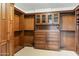 Large walk-in closet with ample shelving and drawers at 10102 E Saddle Horn Trl, Scottsdale, AZ 85255