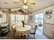 Bright dining area with table and chairs, access to patio at 1027 S Prospector Dr, Apache Junction, AZ 85119