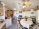 Open concept kitchen and dining area with ample cabinetry at 1027 S Prospector Dr, Apache Junction, AZ 85119