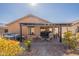 Backyard patio with pergola, hot tub, and seating area at 105 S 224Th Ave, Buckeye, AZ 85326