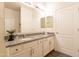 Double vanity bathroom with granite countertops at 105 S 224Th Ave, Buckeye, AZ 85326