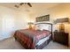 Bright bedroom featuring a king-size bed and ample space at 105 S 224Th Ave, Buckeye, AZ 85326