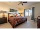 Spacious bedroom with king-size bed and large window at 105 S 224Th Ave, Buckeye, AZ 85326