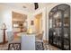 Dining area with kitchen view, round table, and gray chairs at 105 S 224Th Ave, Buckeye, AZ 85326