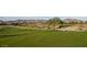 Golf course with sand traps and a tree at 105 S 224Th Ave, Buckeye, AZ 85326