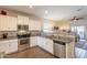 Spacious kitchen with stainless steel appliances and granite counters at 105 S 224Th Ave, Buckeye, AZ 85326