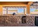 Outdoor kitchen with stainless steel appliances at 105 S 224Th Ave, Buckeye, AZ 85326