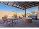 Patio with fire pit, seating area, and hot tub at 105 S 224Th Ave, Buckeye, AZ 85326