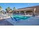 Resort-style pool with plenty of lounge chairs at 105 S 224Th Ave, Buckeye, AZ 85326