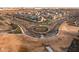 Aerial view of neighborhood, showing street layout and landscaping at 10806 W King St, Avondale, AZ 85323