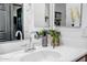 Modern bathroom vanity with sleek chrome faucet and decor at 10806 W King St, Avondale, AZ 85323