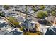 Aerial view of the neighborhood with well-maintained homes and mature trees including palm trees at 1179 N Granada Dr, Chandler, AZ 85226