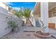 Well maintained backyard offers beautiful patio, seating and mature desert plants at 1179 N Granada Dr, Chandler, AZ 85226