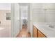 Bathroom featuring wood vanity, shower, and toilet at 1179 N Granada Dr, Chandler, AZ 85226