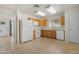 Spacious kitchen featuring tile flooring, ample cabinets, and white appliances at 1179 N Granada Dr, Chandler, AZ 85226