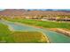 Golf course view with lake and mountains in the background at 11890 N 118Th St, Scottsdale, AZ 85259