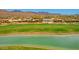 Property is situated on a golf course with a lake view at 11890 N 118Th St, Scottsdale, AZ 85259