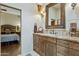 Elegant bathroom with granite vanity and large mirror at 11890 N 118Th St, Scottsdale, AZ 85259