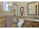 Bathroom with walk-in shower, granite vanity, and tile flooring at 11890 N 118Th St, Scottsdale, AZ 85259