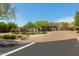 Gated community entrance with landscaping at 11890 N 118Th St, Scottsdale, AZ 85259