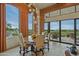 Bright dining room with large windows and golf course views at 11890 N 118Th St, Scottsdale, AZ 85259